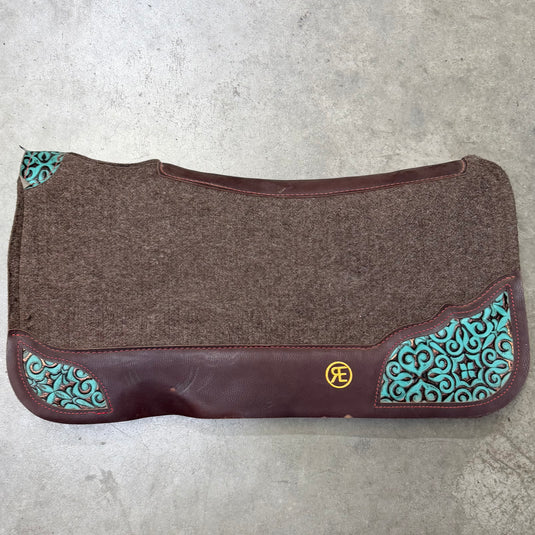 Used Reinsman Turquoise Embossed Corners Wool Pad