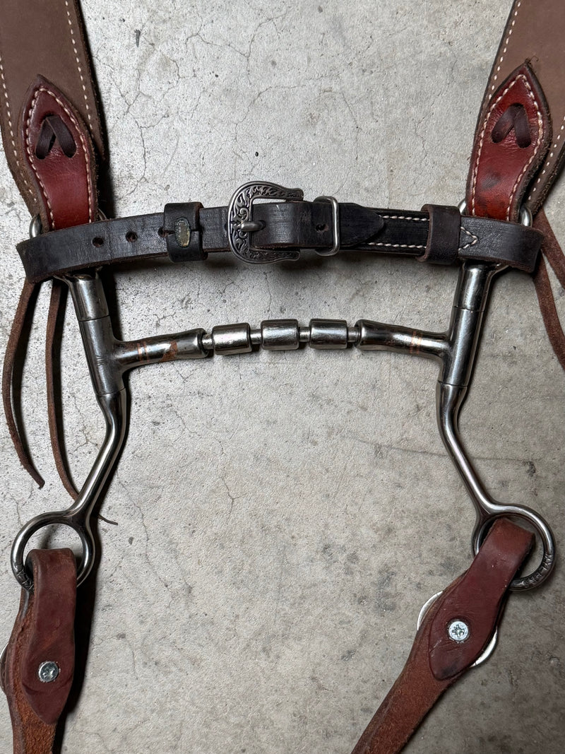 Load image into Gallery viewer, Used Bridle Set - Platte Valley Saddlery Floral Tooled Browband, TOKLAT Mylers Mullen Triple Barrel Bit, Buckaroo Reins
